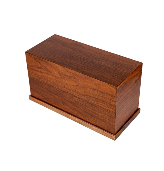 Angled view of 210 cubic inch handcrafted urn made from 1880 British piano English Walnut, satin-finished and uncolored to preserve wood’s history