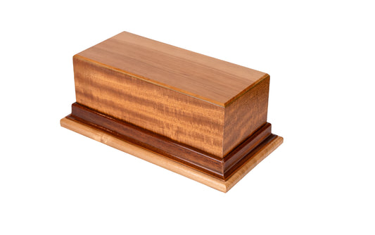 Handcrafted 125 cubic inch urn with European Spruce top, Cuban Mahogany body, American Black Walnut trim, and American White Ash base