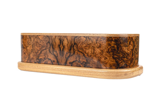 Handcrafted 95 cubic inch urn with English Walnut Symmetrical Burl body and American Ash top and base, natural finish, vintage piano wood