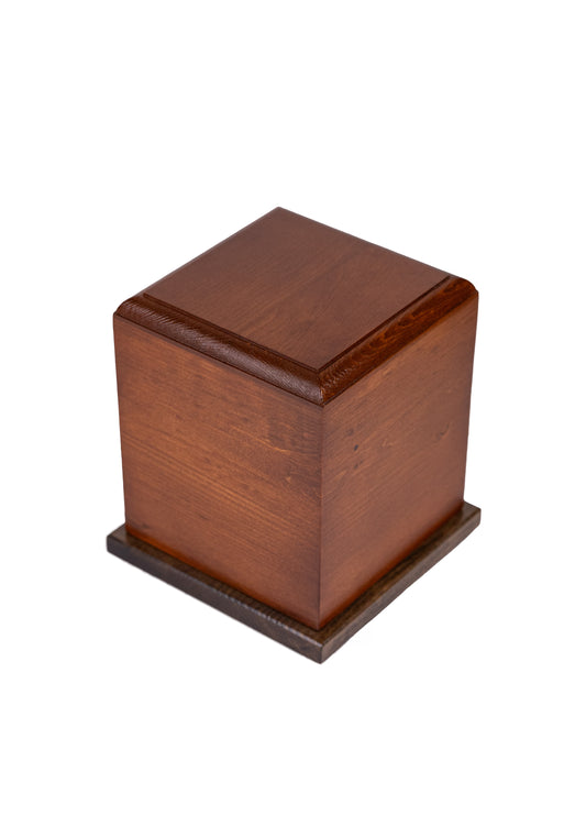 Front and top view of 75 cubic inch cremation urn with Antique Walnut Pine body and Ebony Oak base — reclaimed from a 1901 American piano