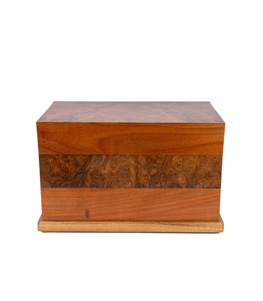 Side view of 180 cubic inch urn with quarter sawn oak band and English Walnut Burl top, crafted from reclaimed historic piano woods