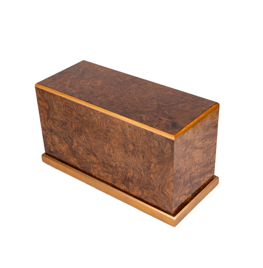 Handcrafted English Walnut Burl cremation urn with gold border accents, high-gloss finish, made from 1890 UK piano wood, 225 cubic inch capacity, angled view