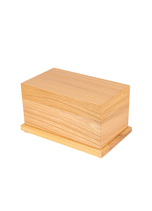 Angled view of 80 cubic inch handcrafted urn from 1910 New York piano White Ash, left unstained with satin finish for natural grain beauty