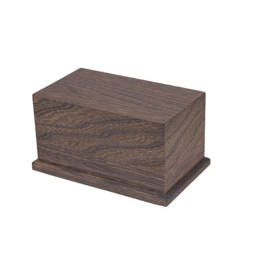 Angled view of 80 cubic inch urn handcrafted from 1910 New York piano White Ash, gray-stained and satin-finished for elegant keepsake display